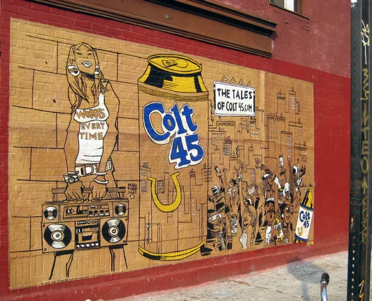 A wall with various images painted on it.