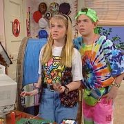 A couple of people standing next to each other.