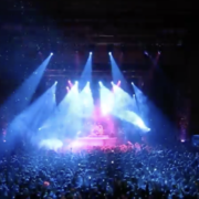 A crowd of people in the middle of an arena.