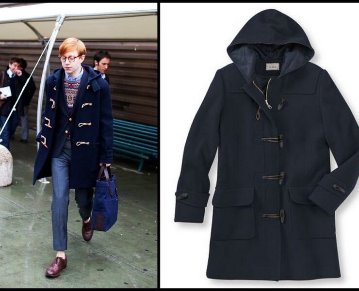 A man in blue jeans and black coat.