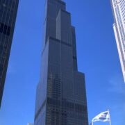 A tall building with a blue sky in the background