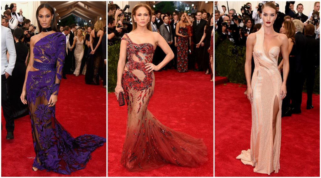 A woman in red dress on the red carpet